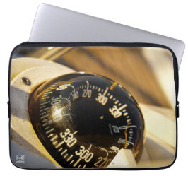 Kompas helpt navigeren en koer behouden.  laptop fodral