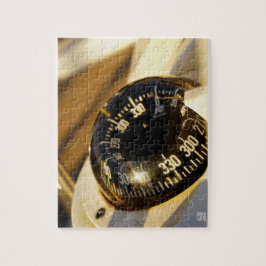 Kompas helpt navigeren en koer behouden.  pussel