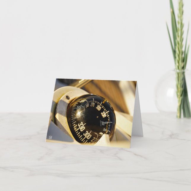 Kompas helpt navigeren en koer behouden.  tack kort (Framsida)