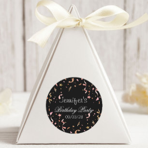 Konfetti rosa och Guld Glitter på svart bakgrund Runt Klistermärke