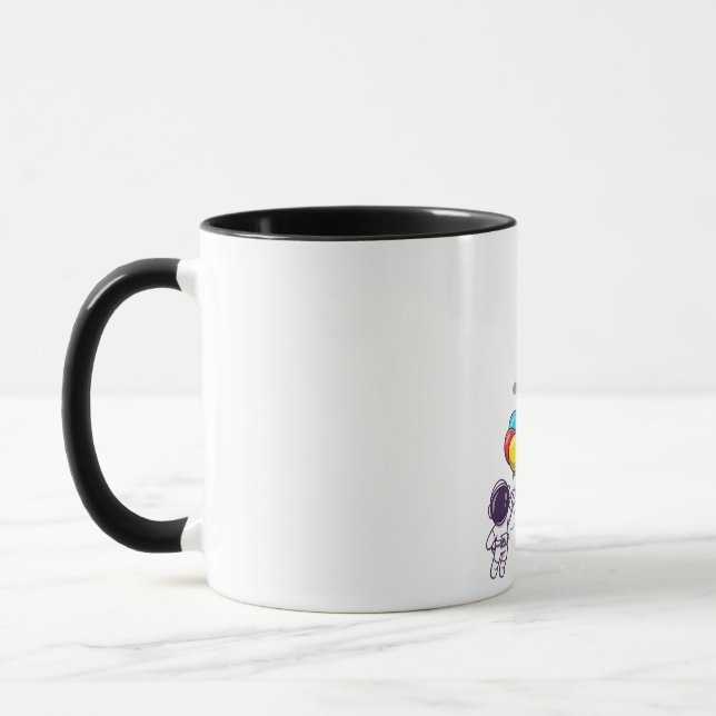 konstig astronaut mugg (Vänster)
