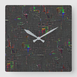 Konstig färgad mörkare teckning under eller över j fyrkantig klocka