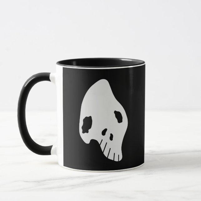 Konstigskalle Mugg (Vänster)