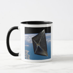 Konstnärbegrepp av NanoSail-D i utrymme Mugg