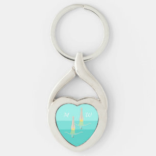 Konstnärlig simning twisted heart silverfärgad nyckelring