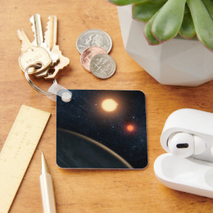 Konstnärskoncept som illustrerar Kepler-16b. Nyckelring