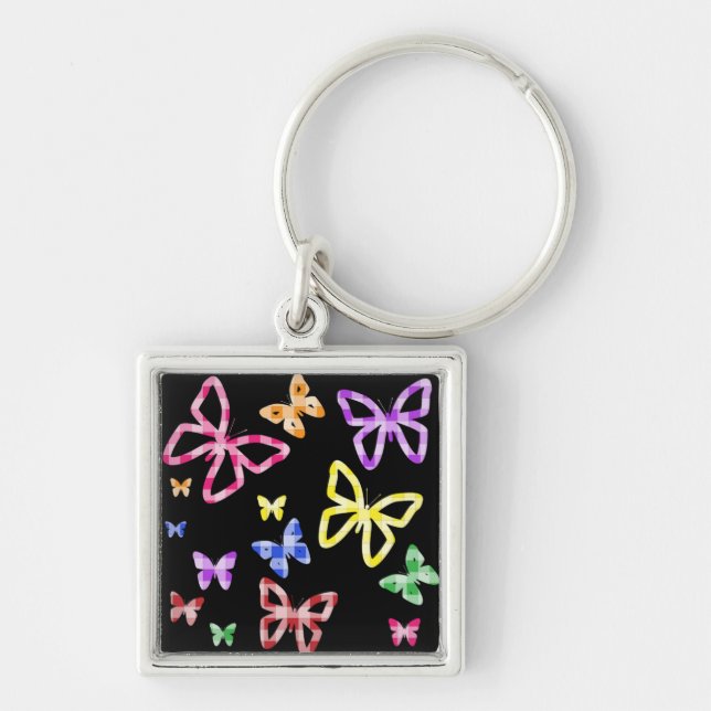 KONTROLLERADE BUTTERFLIES FYRKANTIG SILVERFÄRGAD NYCKELRING (Framsidan)