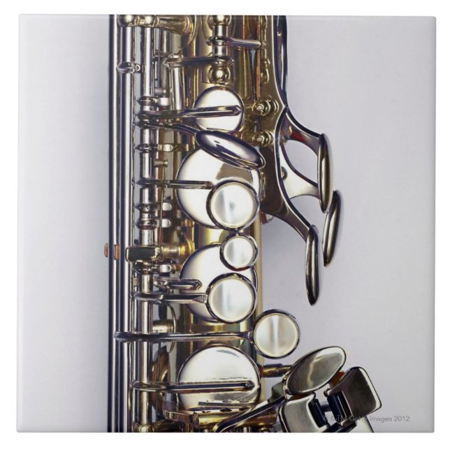 Kontrollerar av saxofon kakelplatta (Framsidan)