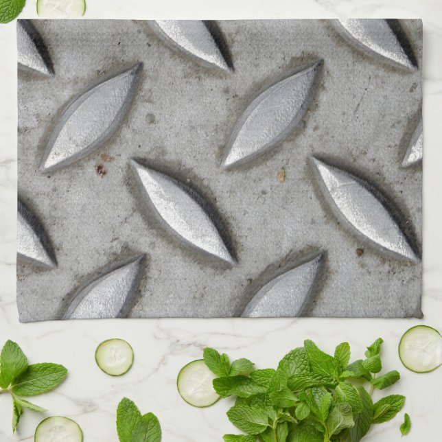 Kontrollören pläterar det industriella lagret kökshandduk (Vikta)