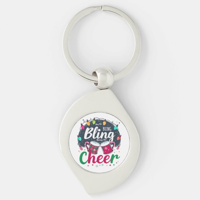 "Köp Bling, Ta Med Glädje." Swirl Silverfärgad Nyckelring (Framsidan)