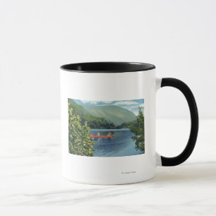 Koppla ihop att kanota på en sjö mugg