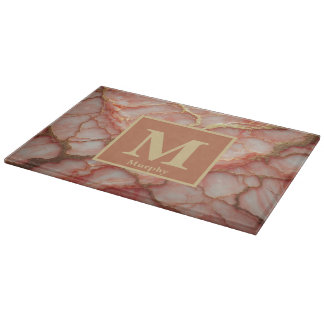 Korallmarmor med antydan om guldstrimmor Monogram