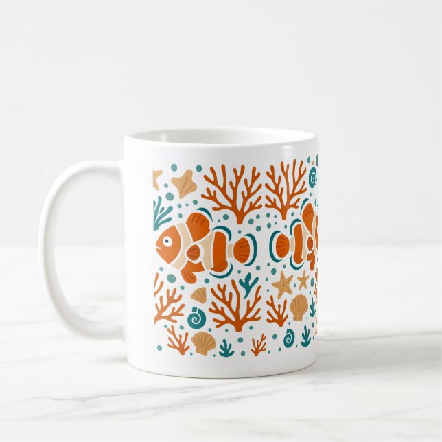 Korallrev av clownfish kaffemugg (Vänster)