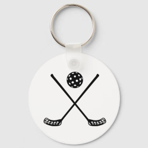 Korsade floorballpinnar nyckelring
