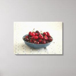 Körsbär i blå skål canvastryck