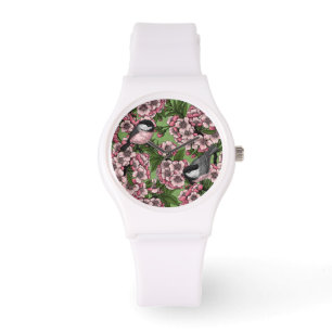 Körsbärs blommar och kycklingar på grönten armbandsur