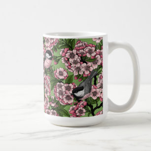 Körsbärs blommar och kycklingar på grönten kaffemugg
