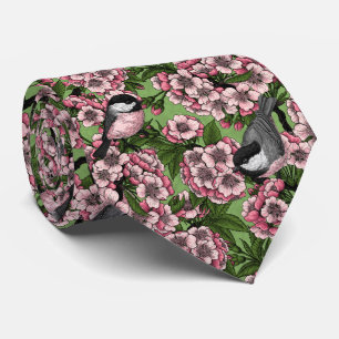 Körsbärs blommar och kycklingar på grönten slips