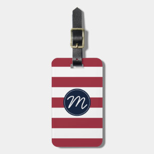Körsbärsröd röd rand med den marinblåa monogramen bagagebricka