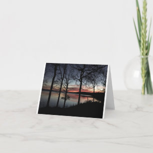 kortet med fotograferar av soluppgång över en sjö kort