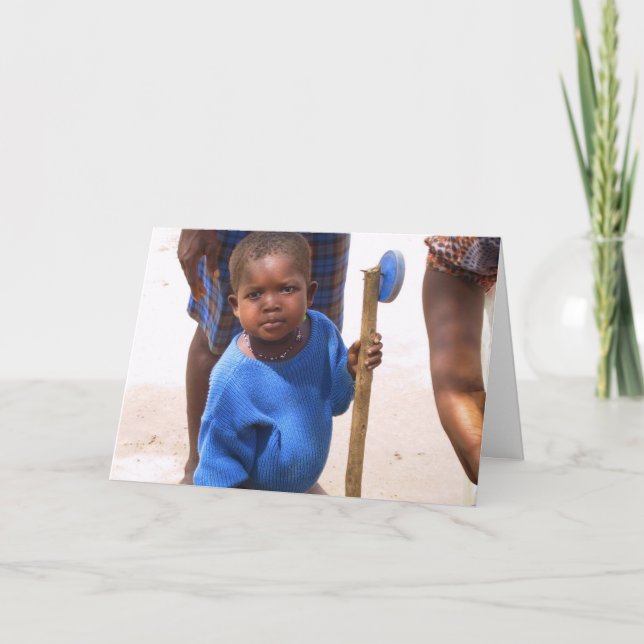 Kotokro flicka med leksaken helgkort (Framsida)