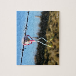 Kracht patser Fubby aan Prikkeldraad. Pussel