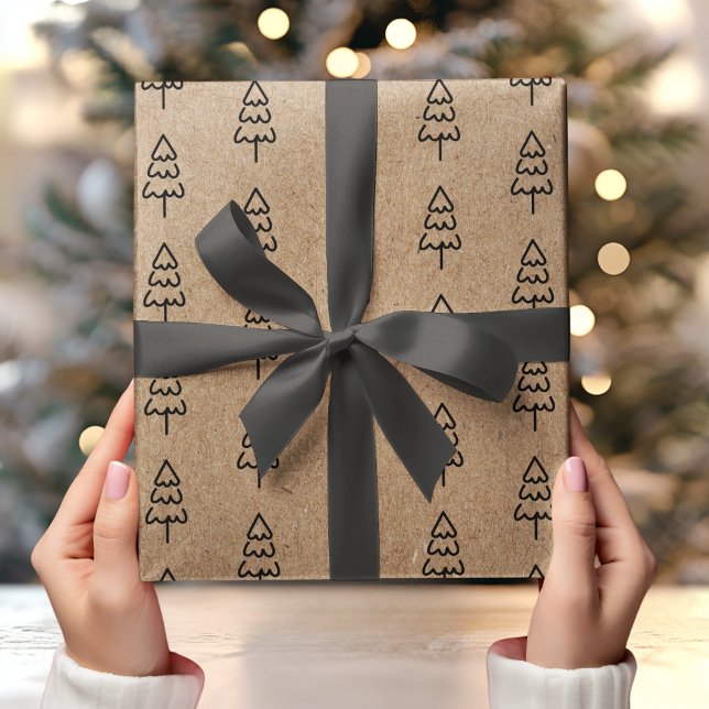 Kraft-bakgrund med minimal svart jul presentpapper (Skapare uppladdad)