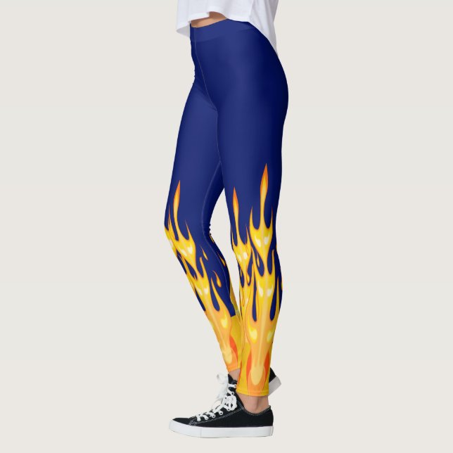 Kraftiga orange gula eldsflammor på blå leggings (Vänster)