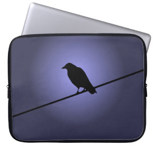 Kråka på en telefonkabel laptop fodral