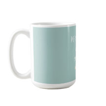 Krämfärgad julklocka med snygg blå slinga