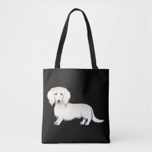 Krämfärgad långhårig dachshund seriehund på svart tygkasse
