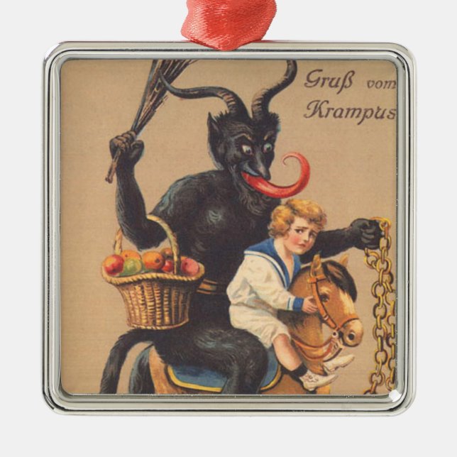 Krampus ridande på käpphäst med pojke julgransprydnad metall (Framsidan)