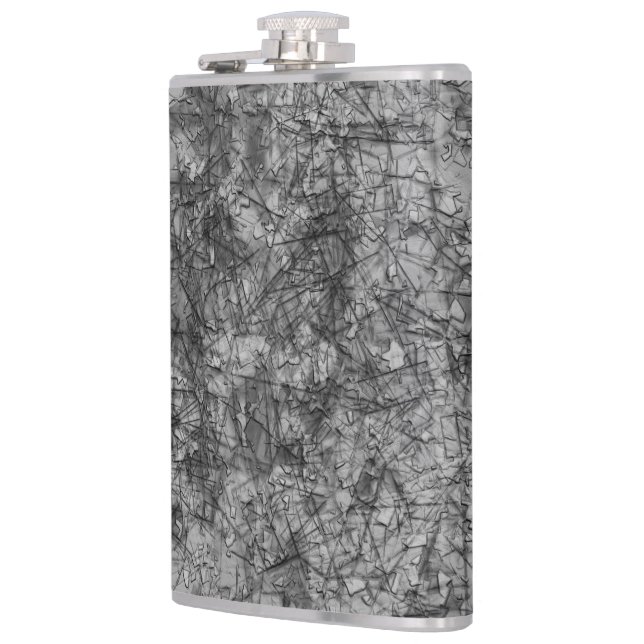 Krepor på repor på ett lätt fläckat grått fickplunta (Vänster)