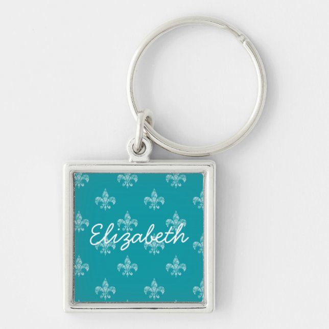 Kricka Fleur de Lis Fyrkantig Silverfärgad Nyckelring (Framsidan)