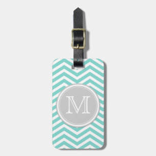 Krickablått- och vitsparre med monogramen bagagebricka