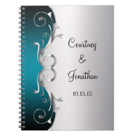 Krickan och utsmyckat silver virvlar runt anteckningsbok med spiral