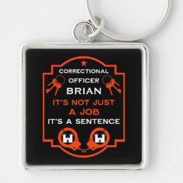kriminalvårdsansvarig fyrkantig silverfärgad nyckelring