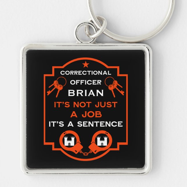 kriminalvårdsansvarig fyrkantig silverfärgad nyckelring (Framsidan)