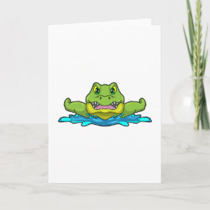 Krokodil som simmar i vatten kort