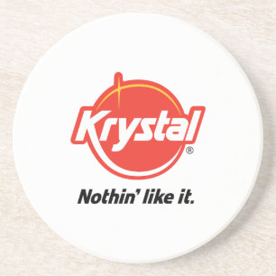 Krystal logotypkustfartyg i vit underlägg sandsten