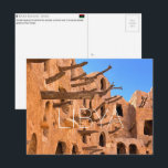Ksar Kabaw, Libya Travel Postcard Vykort<br><div class="desc">Send this beautiful postcard to your loved ones featuring wooden beams protruding from the textured mud-brick walls of an ancient Berber granary of Ksar Kabaw.</div>