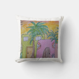 Kuddar med strandstugor och gyllene himmel