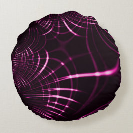 Kurvor i rosa färg och mörk rund kudde