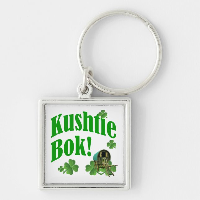 Kushtie bok! fyrkantig silverfärgad nyckelring (Framsidan)