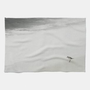 Kustsandpiper på stranden kökshandduk
