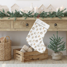Kuststjärna och snäckprydnader liten julstrumpa