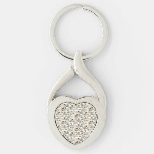 Kuststugans fyr-mönster twisted heart silverfärgad nyckelring