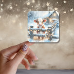 Kute Festive Cow-jul Fyrkantigt Klistermärke<br><div class="desc">Kyla julklistermärken med en vattenfärgad stil-ko som står vid ett rostfritt trästängsel framför en lada. Cute land-odlaren tog julklistermärken eller julkortsförseglare.</div>