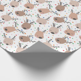 Kute julrenar med punkter och stjärnor presentpapper