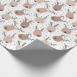 Kute julrenar med punkter och stjärnor presentpapper